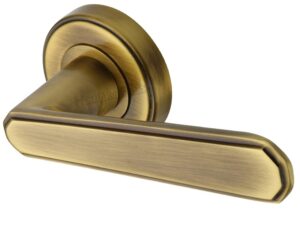 Heritage Brass Century Art Deco Style Door Handles On Round Rose, Antique Brass (Sold In Pairs)