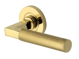 Heritage Brass Signac Knurled Door Handles On Round Rose, Polished Brass (Sold In Pairs)