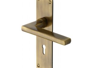 Heritage Brass Trident Low Profile Door Handles On Backplates, Antique Brass - (Sold In Pairs)