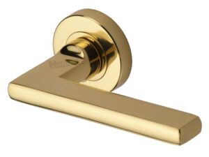 Heritage Brass Trident Polished Brass Door Handles On Round Rose (Sold In Pairs)