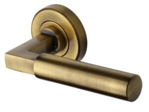 Heritage Brass Bauhaus Antique Brass Door Handles On Round Rose