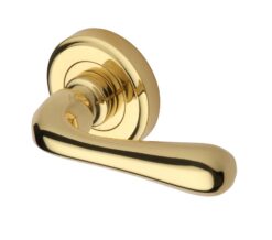 Heritage Brass Charlbury Polished Brass Door Handles On Round Rose (Sold In Pairs)