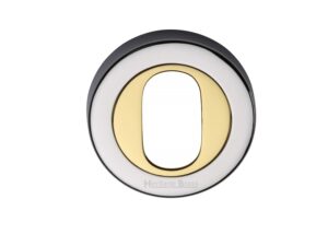 Heritage Brass Oval Profile Key Escutcheon Dual Finish, Polished Chrome With Polished Brass