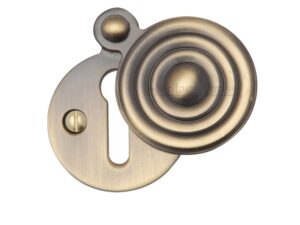 Heritage Brass Standard Round Reeded Covered Key Escutcheon, Antique Brass