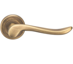 Serozzetta Verdun Door Handles On Round Rose, Antique Brass - (Sold In Pairs)