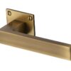 Heritage Brass Delta Low Profile Antique Brass Door Handles On Square Rose (Sold In Pairs)