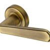 Heritage Brass Century Art Deco Style Door Handles On Round Rose, Antique Brass (Sold In Pairs)