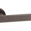 Forme Asti Lever Door Handle on Minimal Round Rose - Urban Bronze