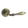 Old English Wrexham Lever Door Handle on Round Rose - Matt Antique Brass