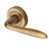 Heritage Brass Sutton Antique Brass Door Handles On Round Rose (Sold In Pairs)