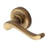 Heritage Brass Bedford Antique Brass Door Handles On Round Rose (Sold In Pairs)