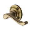 Heritage Brass Bedford Antique Brass Door Handles On Round Rose (Sold In Pairs)