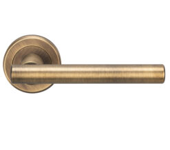 Serozzetta Philadelphia Door Handles On Round Rose, Antique Brass - (Sold In Pairs)