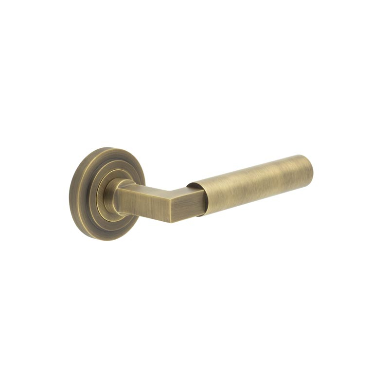 Westminster Door Handle on Stepped Rose Antique Brass